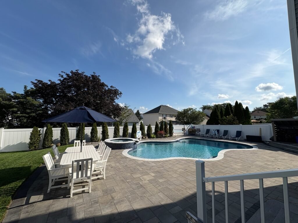 Custom swimming pool design and backyard transformation in Brielle, NJ